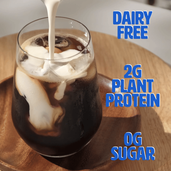 Video showing a plant based milk pouring into a cup of coffee with the caption "dairy free, 2 grams plant protein, 0 grams sugar"